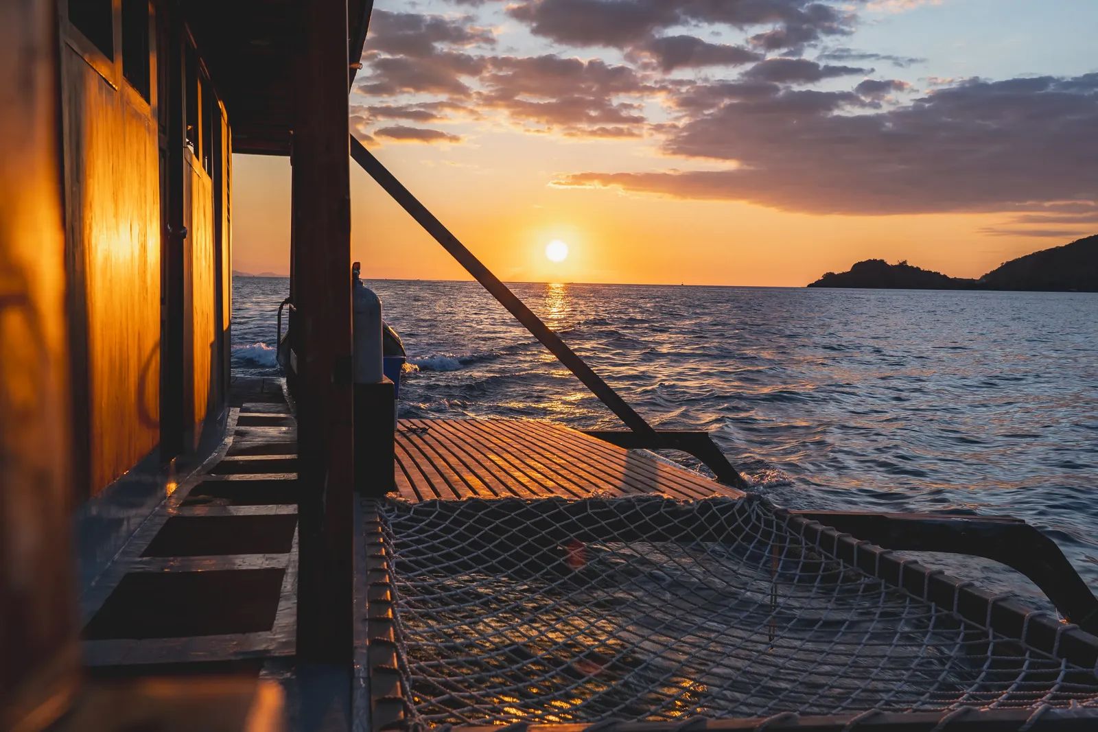 Capoeng liveaboard – sunset view from the dive deck – Komodo, Indonesia